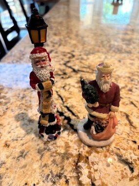 Pair of Santa Claus Figurines